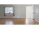 Sunlit living room with hardwood floors and a bright bay window at 1035 Quartz St, Golden, CO 80401