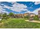 Exterior shot of a large grassy common area with benches at the apartment complex at 9019 E Panorama Cir # D207, Englewood, CO 80112