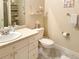 Well-lit bathroom featuring a single vanity and decorative accents at 9390 W Chatfield Pl # 103, Littleton, CO 80128