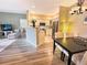 Inviting space featuring a bright living room and kitchen with a dining area at 9390 W Chatfield Pl # 103, Littleton, CO 80128