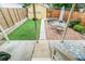 Brick patio, artificial turf, and seating area at 3839 Yates St, Denver, CO 80212