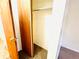 Bedroom closet with wooden sliding doors, providing ample storage space at 14720 E Kentucky Dr # 611, Aurora, CO 80012
