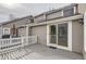 Private deck space with sliding door access to inside, ideal for outdoor lounging and dining at 7580 S Monaco Way, Centennial, CO 80112