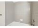 Bathroom showing neutral tile and bathtub at 7580 S Monaco Way, Centennial, CO 80112
