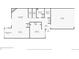 First floor layout featuring a kitchen, living room, and bedroom at 7580 S Monaco Way, Centennial, CO 80112