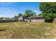 Spacious backyard featuring a patio area, ready for entertaining, with a large lawn area at 13542 Achilles Dr, Lone Tree, CO 80124