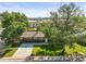 Charming single story home with a well-maintained yard and mature trees at 13542 Achilles Dr, Lone Tree, CO 80124