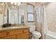 Cozy bathroom featuring a shower/tub combo and a granite-topped vanity at 6534 S Union Way, Littleton, CO 80127