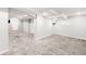 Spacious basement offers new carpet, neutral paint, and recessed lighting at 2715 W 37Th Ave, Denver, CO 80211
