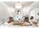 Inviting living room with built-in shelving, stylish decor, and warm hardwood floors at 2715 W 37Th Ave, Denver, CO 80211