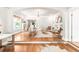 Spacious living room featuring hardwood floors, comfortable seating, and an open layout at 2715 W 37Th Ave, Denver, CO 80211