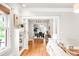 Inviting living room showcasing hardwood floors and an open floor plan into the dining room at 2715 W 37Th Ave, Denver, CO 80211