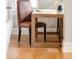 Compact office nook with a simple desk and chair setup, perfect for focused work at 2715 W 37Th Ave, Denver, CO 80211