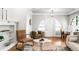 Cozy office nook with hardwood floors, a comfortable chair, and natural lighting at 2715 W 37Th Ave, Denver, CO 80211