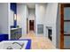 Modern bathroom with soaking tub, fireplace, tiled shower, and vanity with stone countertop at 458 Adams St, Denver, CO 80206