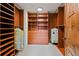 Well-organized walk-in closet with built-in shelves and drawers, offering ample storage space at 458 Adams St, Denver, CO 80206