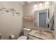 Clean bathroom with updated vanity and fixtures at 8015 W Calhoun Pl, Littleton, CO 80123