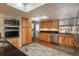 Updated kitchen with light wood cabinets and granite counters at 8015 W Calhoun Pl, Littleton, CO 80123