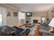 Bright living room with hardwood floors and fireplace at 8015 W Calhoun Pl, Littleton, CO 80123