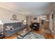 Open living room with view into kitchen and backyard at 8015 W Calhoun Pl, Littleton, CO 80123