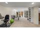 Finished basement area with sliding doors and custom built-in shelving at 175 Harrison St, Denver, CO 80206