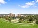 Scenic aerial view showcasing a green park, walking paths, and lush trees in the city at 534 E 7Th Ave # 101, Denver, CO 80203