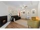 Inviting living space with a fireplace, ceiling fan, and contemporary decor at 534 E 7Th Ave # 101, Denver, CO 80203
