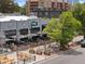 Street view of a popular restaurant with patio seating and stylish exterior design at 534 E 7Th Ave # 101, Denver, CO 80203