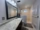 Bathroom featuring sleek vanity and glass-enclosed shower at 5777 County Road 154, Elizabeth, CO 80107