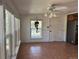 Sun-filled dining area with tile floors and large windows, offering a bright and airy space at 5777 County Road 154, Elizabeth, CO 80107