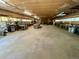 Spacious outbuilding interior showcasing ample storage and workbench areas at 5777 County Road 154, Elizabeth, CO 80107