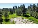 Grassy clearing showing the potential for building on this treed property at 5777 County Road 154, Elizabeth, CO 80107