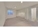 Unfurnished basement showcasing recessed lighting, a small window and doorway to other spaces at 4006 E Geddes Cir, Centennial, CO 80122