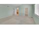 Spacious carpeted main bedroom featuring a vaulted ceiling, walk-in closet and ensuite bathroom access at 4006 E Geddes Cir, Centennial, CO 80122