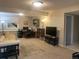 Finished basement featuring plush carpeting, a full workstation, and entertainment area at 5479 E Weaver Ave, Centennial, CO 80121