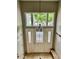 Entryway featuring a decorative front door, chandelier and sidelight windows at 5479 E Weaver Ave, Centennial, CO 80121