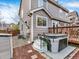 Exterior view of a home featuring a hot tub and wooden deck at 9774 Burberry Way, Highlands Ranch, CO 80129