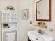 Modern bathroom with stylish vanity, decorative mirror, and contemporary fixtures create a clean and elegant space at 9774 Burberry Way, Highlands Ranch, CO 80129