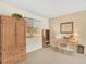 Bedroom featuring wood furniture and natural light. Provides a comfortable and functional space for work or relaxation at 9774 Burberry Way, Highlands Ranch, CO 80129