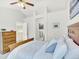 Bright main bedroom with vaulted ceilings and an ensuite bathroom at 9774 Burberry Way, Highlands Ranch, CO 80129
