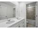 Bathroom featuring double sinks and a shower/tub combo at 39713 Penn Rd, Elizabeth, CO 80107