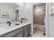 Bright bathroom featuring a double vanity with modern fixtures and a tub at 39713 Penn Rd, Elizabeth, CO 80107