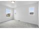 Bedroom with neutral paint, carpet, and bright windows at 39713 Penn Rd, Elizabeth, CO 80107