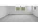Bedroom with neutral paint, carpet, and bright windows at 39713 Penn Rd, Elizabeth, CO 80107