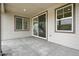 Covered patio offering an outdoor living space with views of the backyard and ample natural light at 39713 Penn Rd, Elizabeth, CO 80107