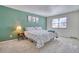 Spacious bedroom with carpeted floors and a large window at 8267 Quay Ct, Arvada, CO 80003