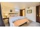Basement bedroom featuring cozy decor, and soft lighting for a restful atmosphere at 944 S Euclid Way, Denver, CO 80209