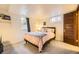 Serene bedroom featuring cozy decor, and soft lighting for a restful atmosphere at 944 S Euclid Way, Denver, CO 80209