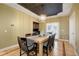 Formal dining room featuring a rustic wooden table at 6517 Perry Park Blvd, Larkspur, CO 80118