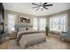 Main bedroom with fireplace and plenty of natural light at 6517 Perry Park Blvd, Larkspur, CO 80118